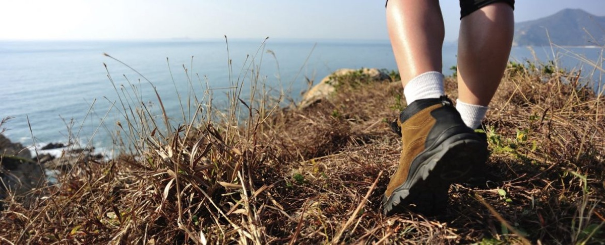 Man hiking along the coast